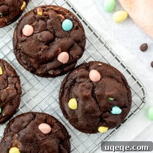 Mini egg chocolate cookies on a cooling rack