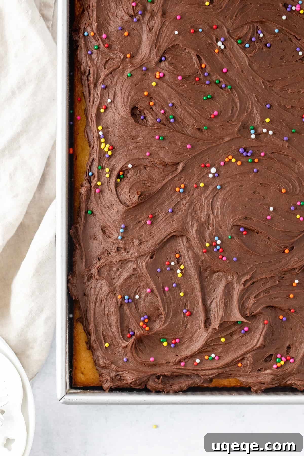 Sunshine Yellow Sheet Cake with Velvety Chocolate Frosting 8 Sheet pan of yellow vanilla cake with creamy chocolate frosting