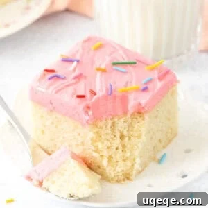 Classic Vanilla Sheet Cake Recipe for Moist, Crowd-Pleasing Dessert 10 Slice of moist vanilla sheet cake cake with bite taken out
