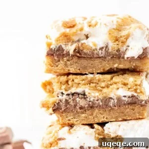 S'mores Cookie Bar Recipe: Gooey Graham, Chocolate & Marshmallow 8 stack of three S'mores cookie bars