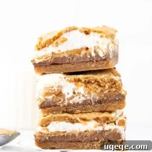 Peanut Butter S'mores Bars Recipe — Gooey Chocolate & Graham Cracker Bars 8 stack of three peanut butter s'mores bars
