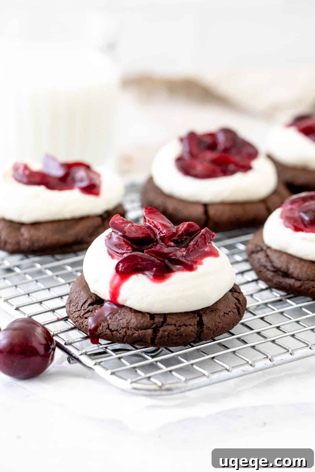 Black Forest Cookies: Chocolate and Cherry Cookie Recipe 2 black forest cookies on a cooling rack
