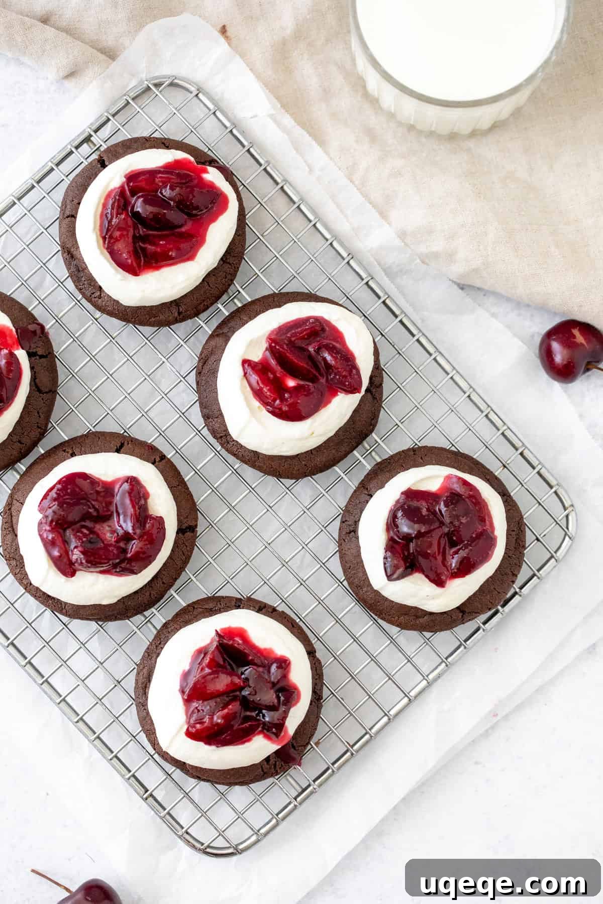 Black Forest Cookies: Chocolate and Cherry Cookie Recipe 3 Chocolate cookies topped with whipped cream and cherry sauce