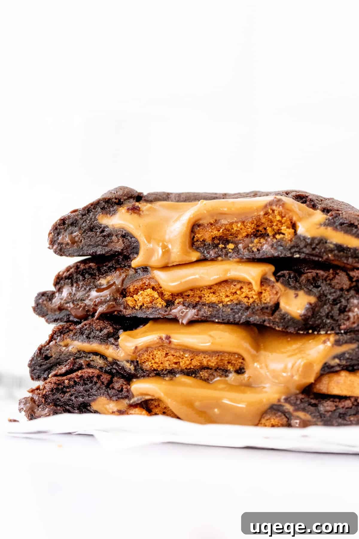 Chocolate Biscoff Cookies Recipe 3 Stack of BIscoff stuffed chocolate cookies broken in half