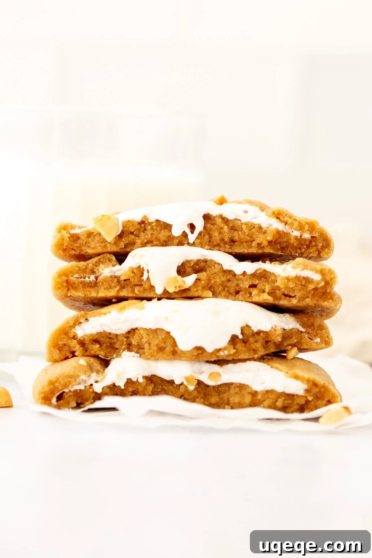 Fluffernutter Cookies: Peanut Butter & Marshmallow Cookies 3 Stack of peanut butter marshmallow cookies broken in half
